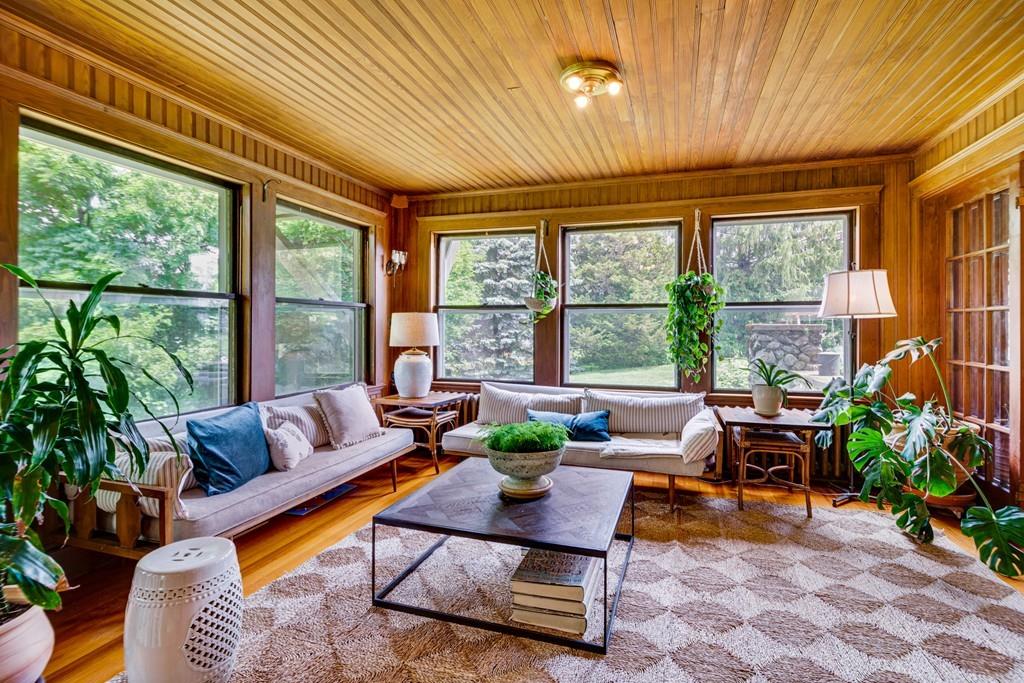 208 Ridge Street Winchester, MA 01890 - Photo 15 of 42 a living room with patio furniture and a potted plant