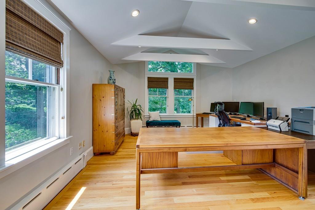 208 Ridge Street Winchester, MA 01890 - Photo 19 of 42 a room with a bed and a large window