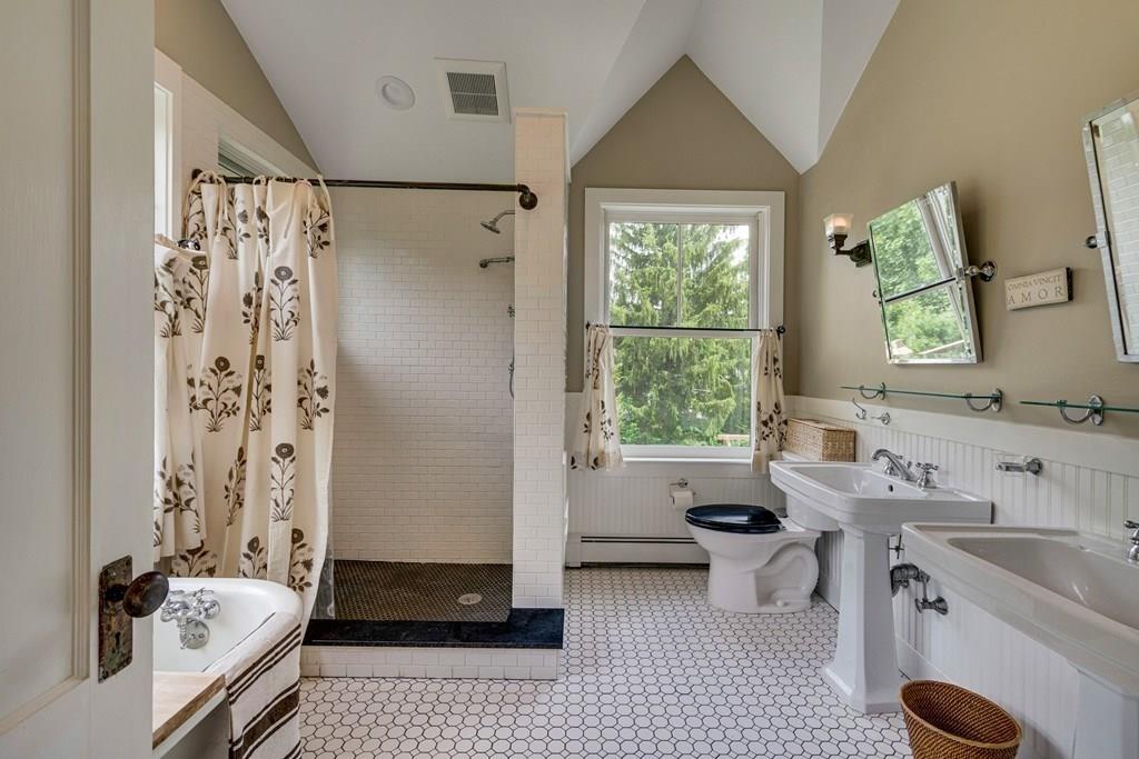 208 Ridge Street Winchester, MA 01890 - Photo 24 of 42 a bathroom with a sink toilet and shower