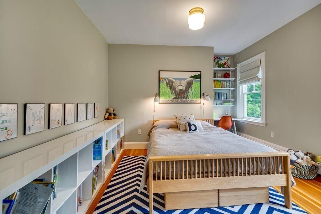 208 Ridge Street Winchester, MA 01890 - Photo 32 of 42 a bedroom with furniture and a window