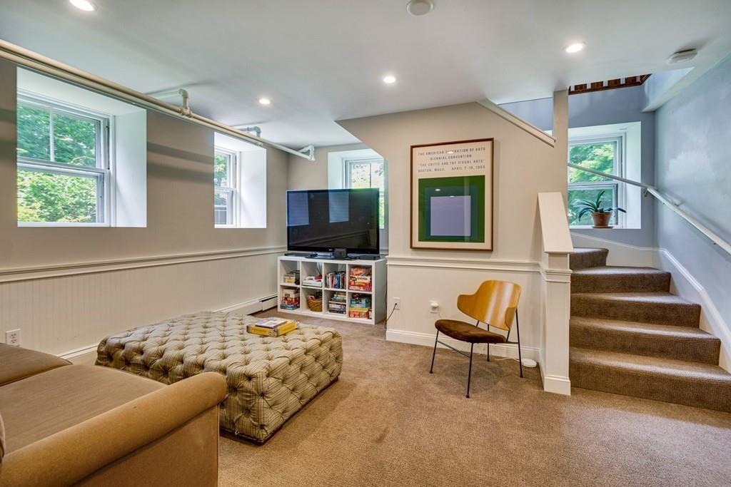 208 Ridge Street Winchester, MA 01890 - Photo 33 of 42 a living room with furniture and a flat screen tv