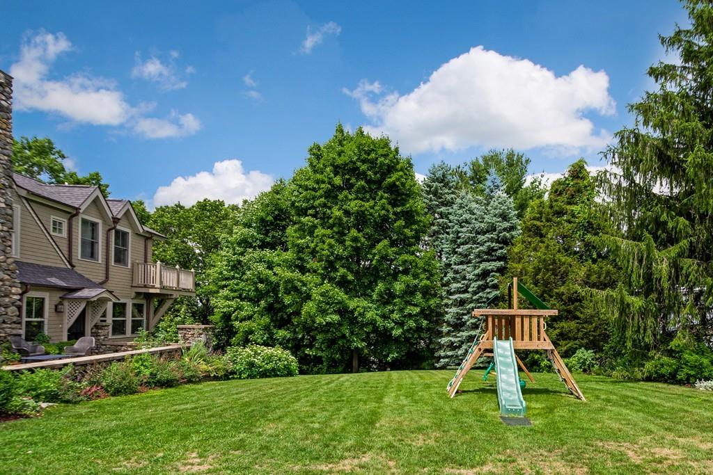 208 Ridge Street Winchester, MA 01890 - Photo 37 of 42 a view of a house with a yard