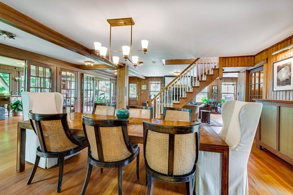 208 Ridge Street Winchester, MA 01890 - Photo 8 of 42 a view of a dining room with furniture a chandelier and wooden floor
