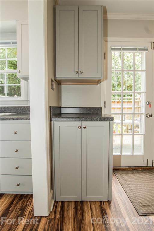 852 McAlway Road Charlotte, NC 28211 - Photo 12 of 26 a view of a kitchen with a sink dishwasher and wooden cabinets