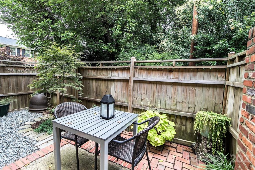 852 McAlway Road Charlotte, NC 28211 - Photo 22 of 26 a view of a backyard with furniture and outdoor seating