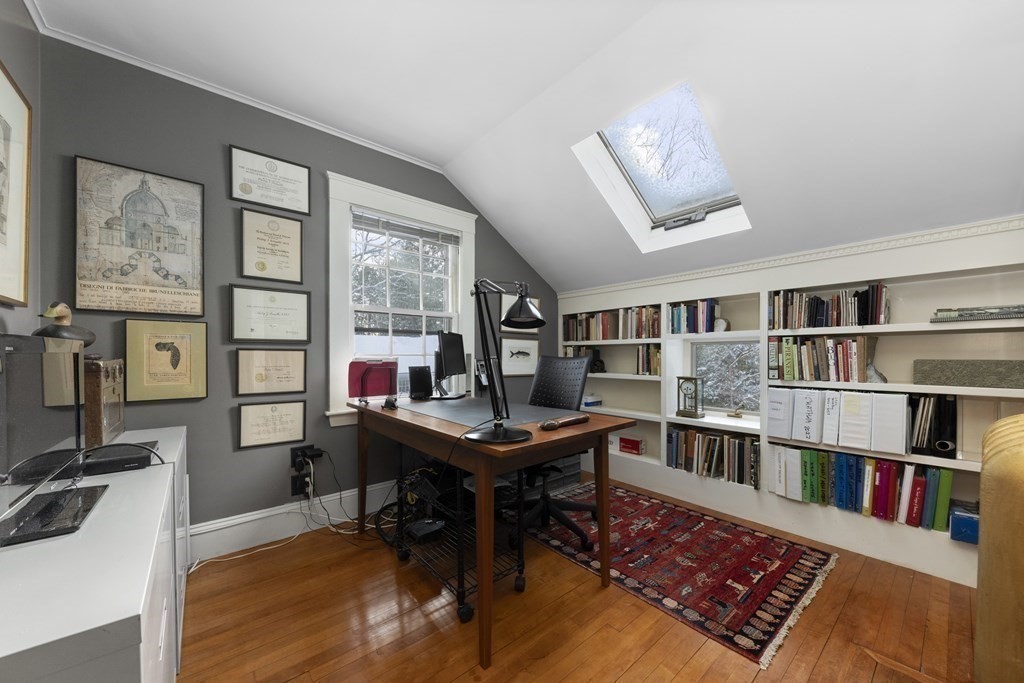 39 Somerset Road Lexington, MA 02420 - Photo 14 of 20 a room with furniture and a book shelf