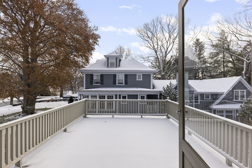 39 Somerset Road Lexington, MA 02420 - Photo 16 of 20 a view of residential house with wooden fence and trees