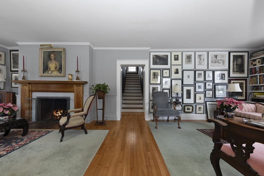 39 Somerset Road Lexington, MA 02420 - Photo 3 of 20 a living room with furniture and a fireplace