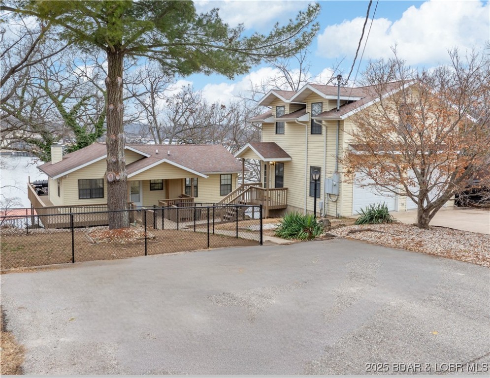 1615 Nichols Road Osage Beach, MO 65065 - Photo 1 of 1 2 car detached garage with living space above, lot