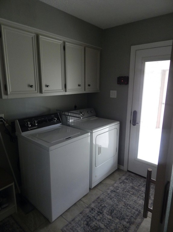 5219 Glenmere Lane Spring, TX 77379 - Photo 30 of 36 a utility room with dryer and washer