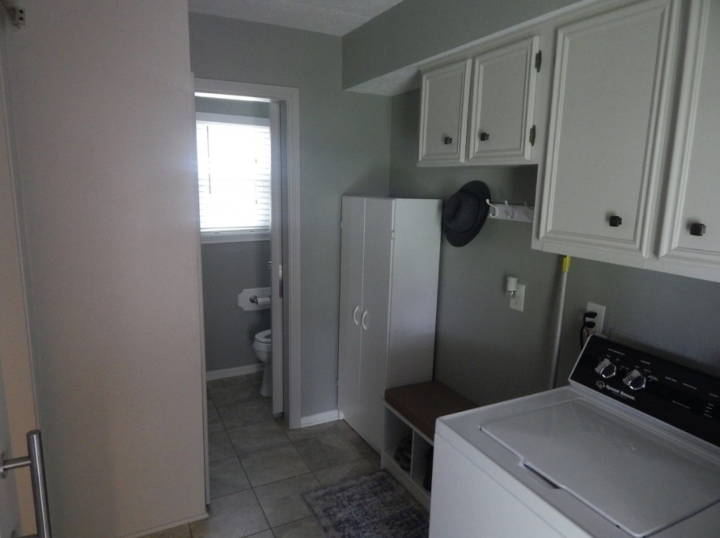 5219 Glenmere Lane Spring, TX 77379 - Photo 31 of 36 a room with storage and utility