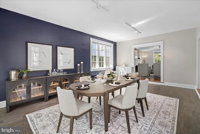 a house view with a sitting space and garden