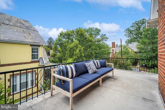 a view of a house with a swimming pool
