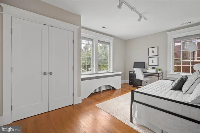 a view of a house with a yard patio and fire pit