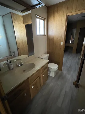 a bathroom with a sink and mirror