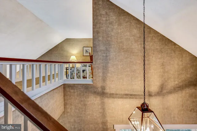 a view of entryway with a front door