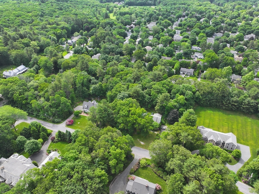 25 Rockport Road Weston, MA 02493 - Photo 3 of 13 an aerial view of a house with a yard