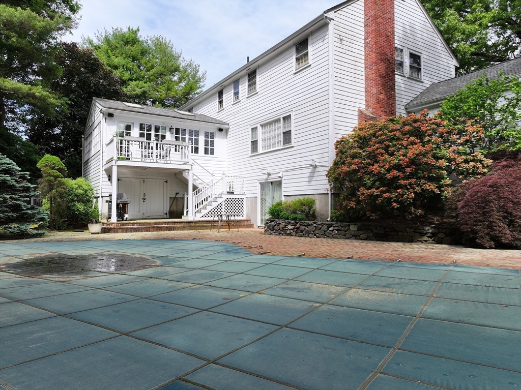 25 Rockport Road Weston, MA 02493 - Photo 4 of 13 a view of house with outdoor space and parking