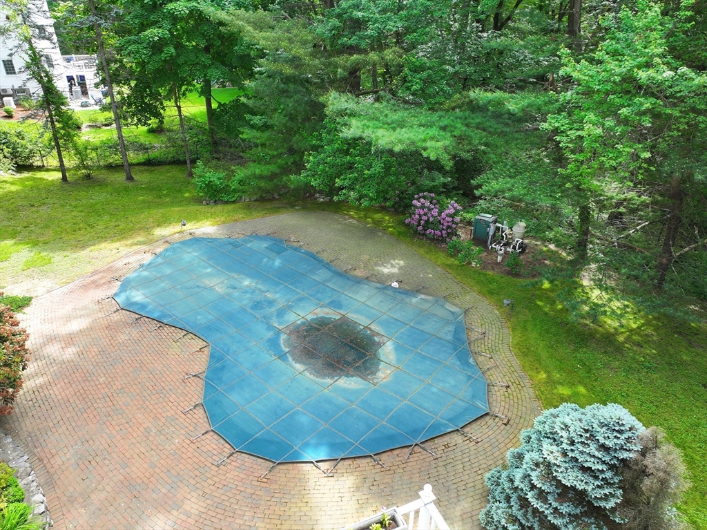 25 Rockport Road Weston, MA 02493 - Photo 6 of 13 a view of a green yard