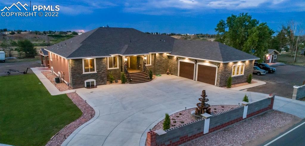 1777 16th Street Greeley, CO 80631 - Photo 2 of 42 a view of a house with a yard