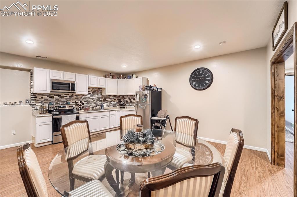 1777 16th Street Greeley, CO 80631 - Photo 28 of 42 a view of a dining room with furniture