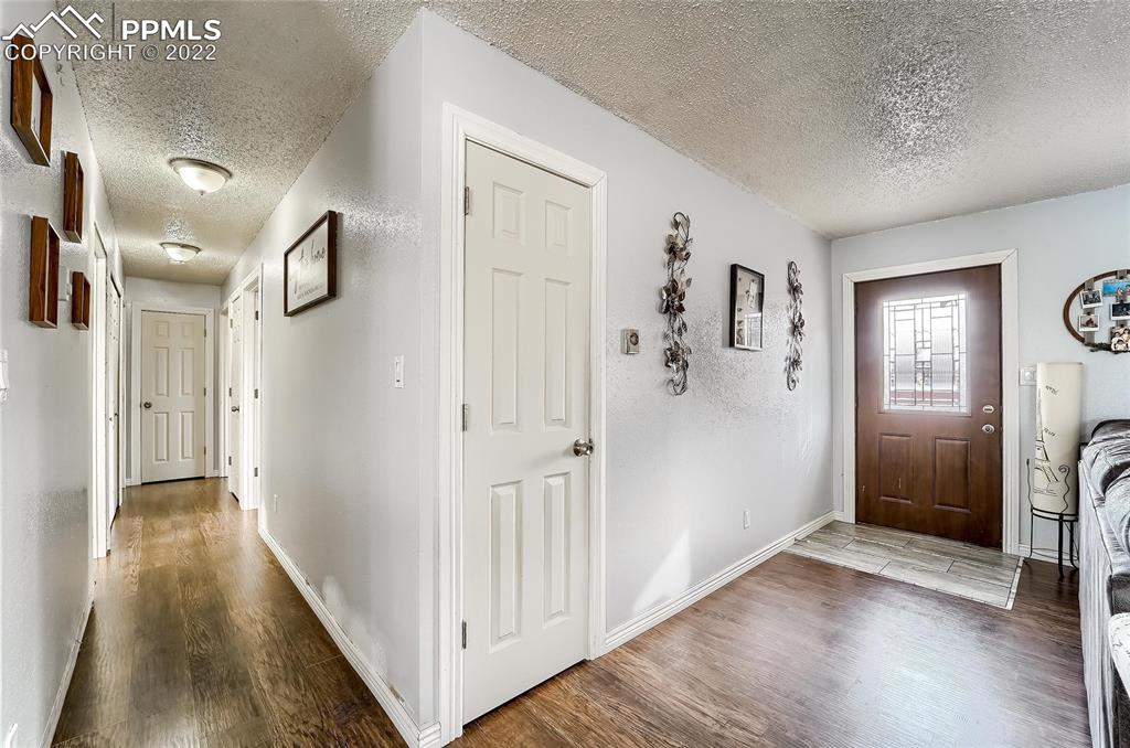 1777 16th Street Greeley, CO 80631 - Photo 34 of 42 a view of a hallway with wooden floor