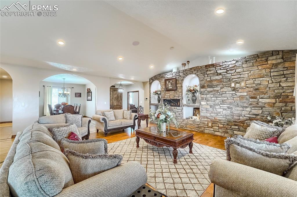 1777 16th Street Greeley, CO 80631 - Photo 5 of 42 a living room with furniture and a fireplace