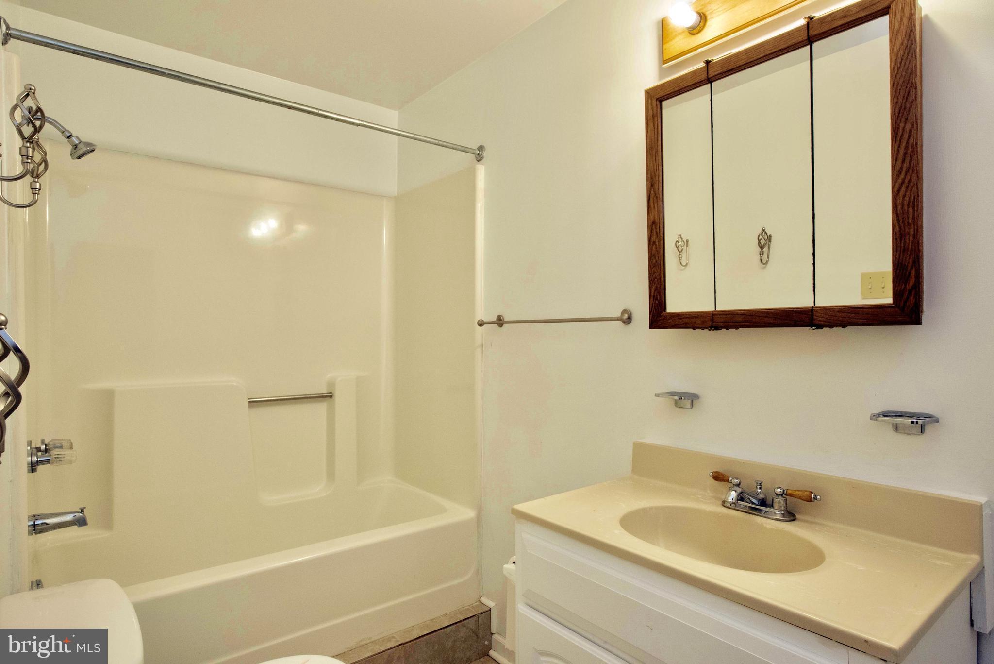 11500 Ropeknot Road Lusby, MD 20657 - Photo 25 of 30 Lower Level Full Bath Basement