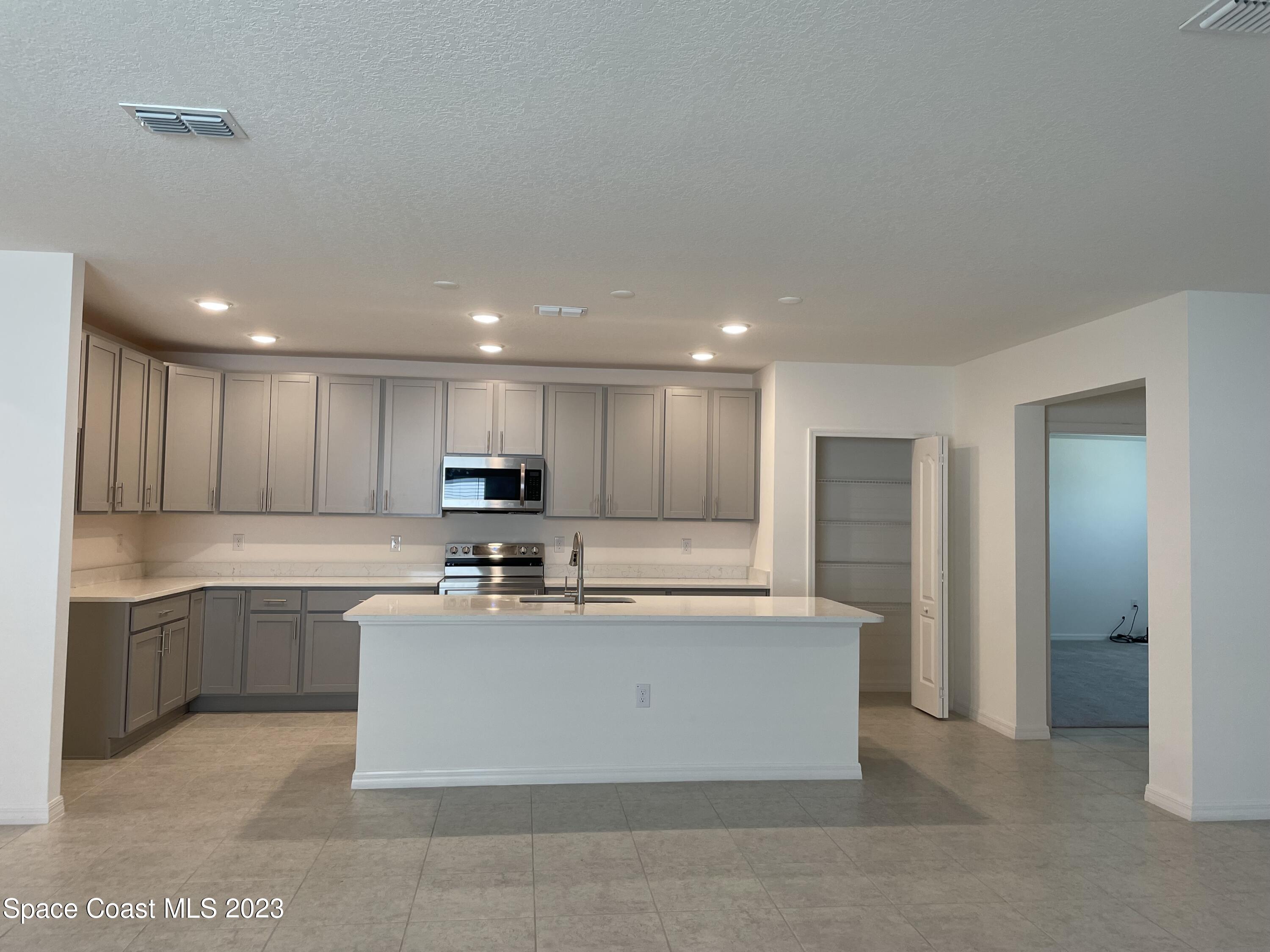 3516 Rixford Way Palm Bay, FL 32909 - Photo 3 of 15 IMG_2303