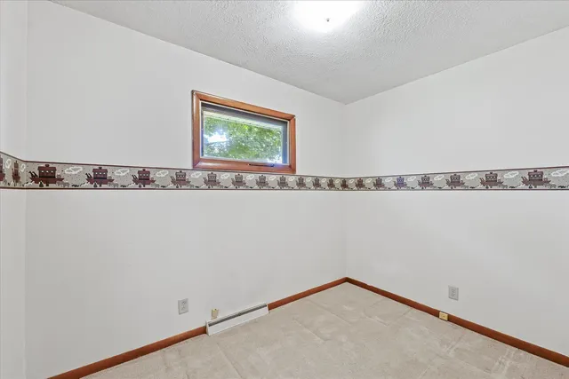 a view of a wall with a window