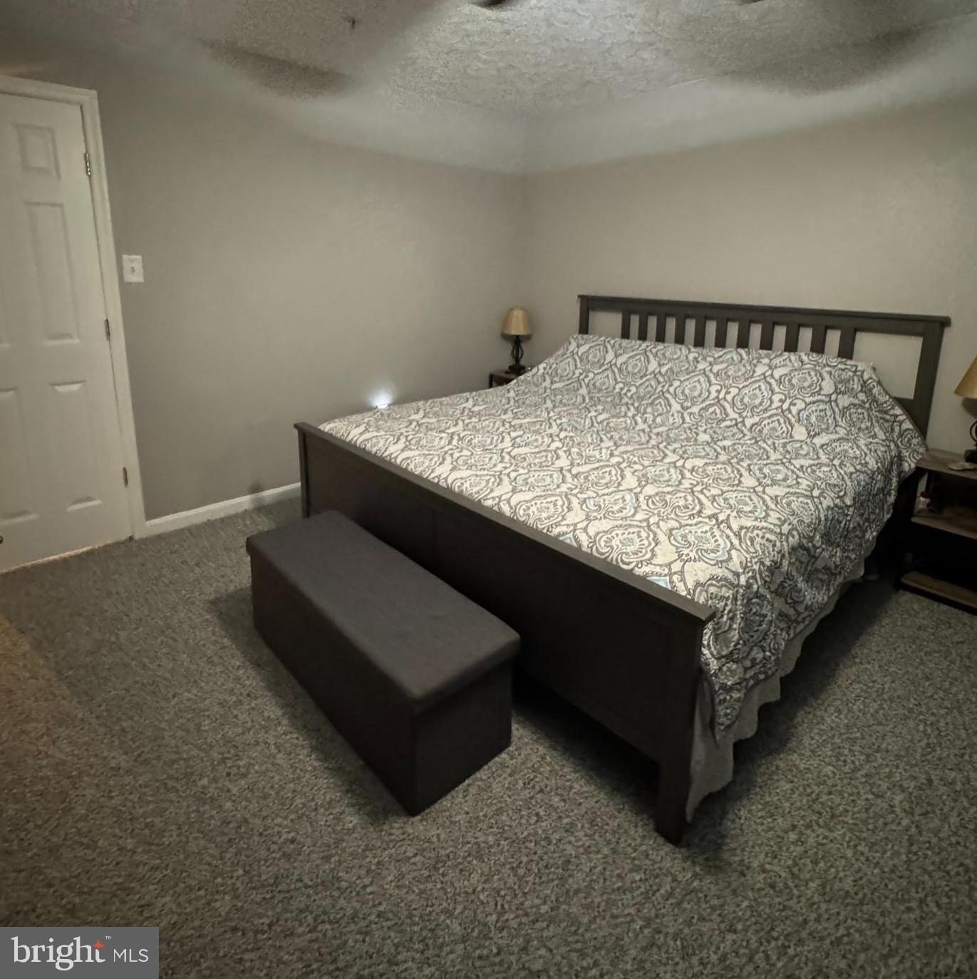 24 Keppels Mill Court Rising Sun, MD 21911 - Photo 2 of 19 a bed sitting in a bedroom next to a window