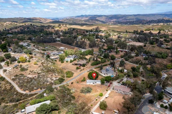 an aerial view of garden with lots of trees