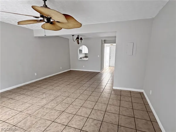 a view of an empty room and window