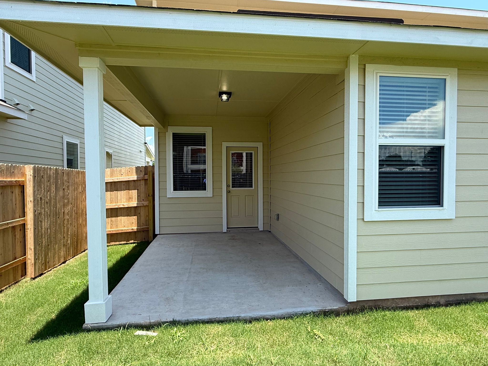 2709 Totley Road Manor, TX 78653 - Photo 7 of 40 a view of a back yard of the house