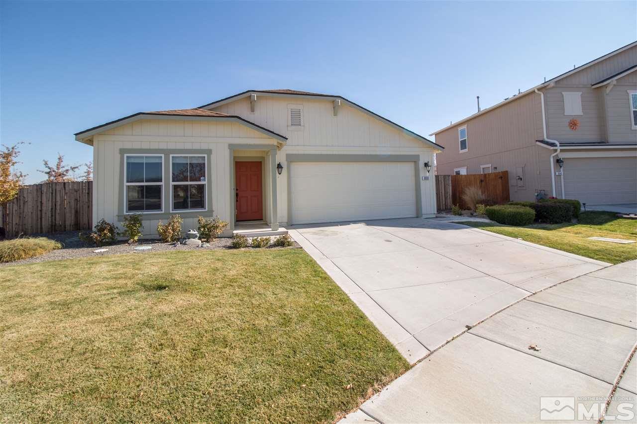 8930 Convair Way Reno, NV 89506 - Photo 1 of 1 a front view of a house with yard