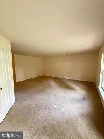 an empty room with a natural light