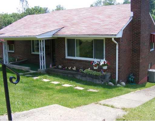 320 McClelland Road Canonsburg, PA 15317 - Photo 1 of 8 Exterior Front. Solid Red Brick ranch with new windows! Faces McClelland Road but access from the rear driveway off Dicio.