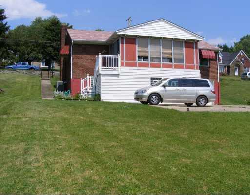 320 McClelland Road Canonsburg, PA 15317 - Photo 7 of 8 Exterior Back. Large rear yard. Enclosed back porch for extra living space.