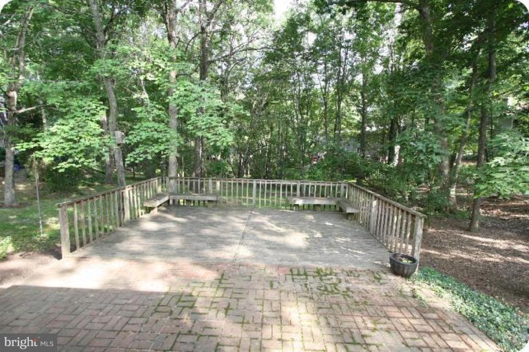 10915 Hunt Club Road Reston, VA 20190 - Photo 11 of 27 a view of a yard with large trees