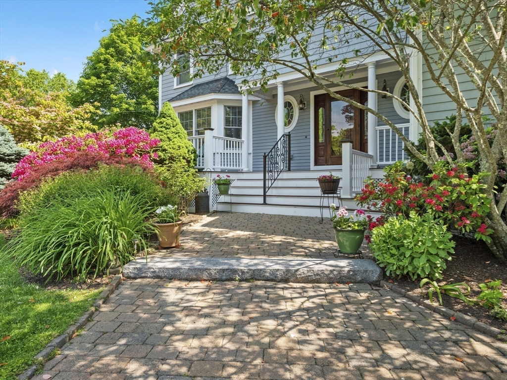 22 Bryant Road Lexington, MA 02420 - Photo 2 of 40 a front view of a house with yard