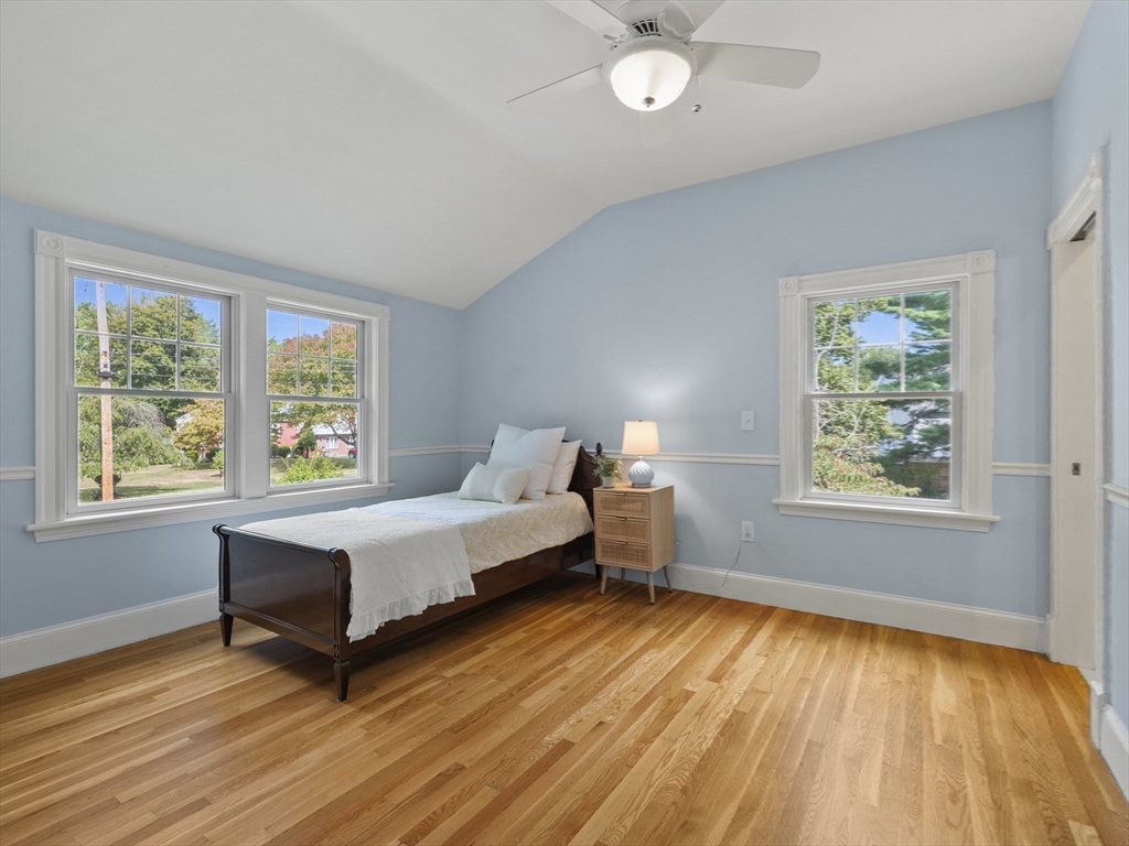 22 Bryant Road Lexington, MA 02420 - Photo 22 of 40 a spacious bedroom with a bed and window