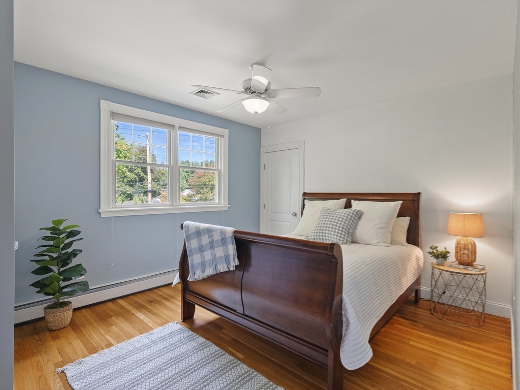 22 Bryant Road Lexington, MA 02420 - Photo 24 of 40 a bedroom with bed and window