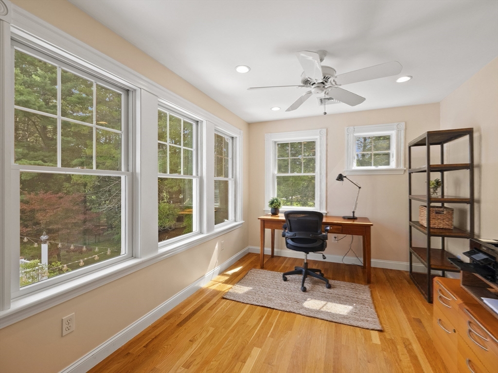 22 Bryant Road Lexington, MA 02420 - Photo 26 of 40 a living room with furniture and large windows