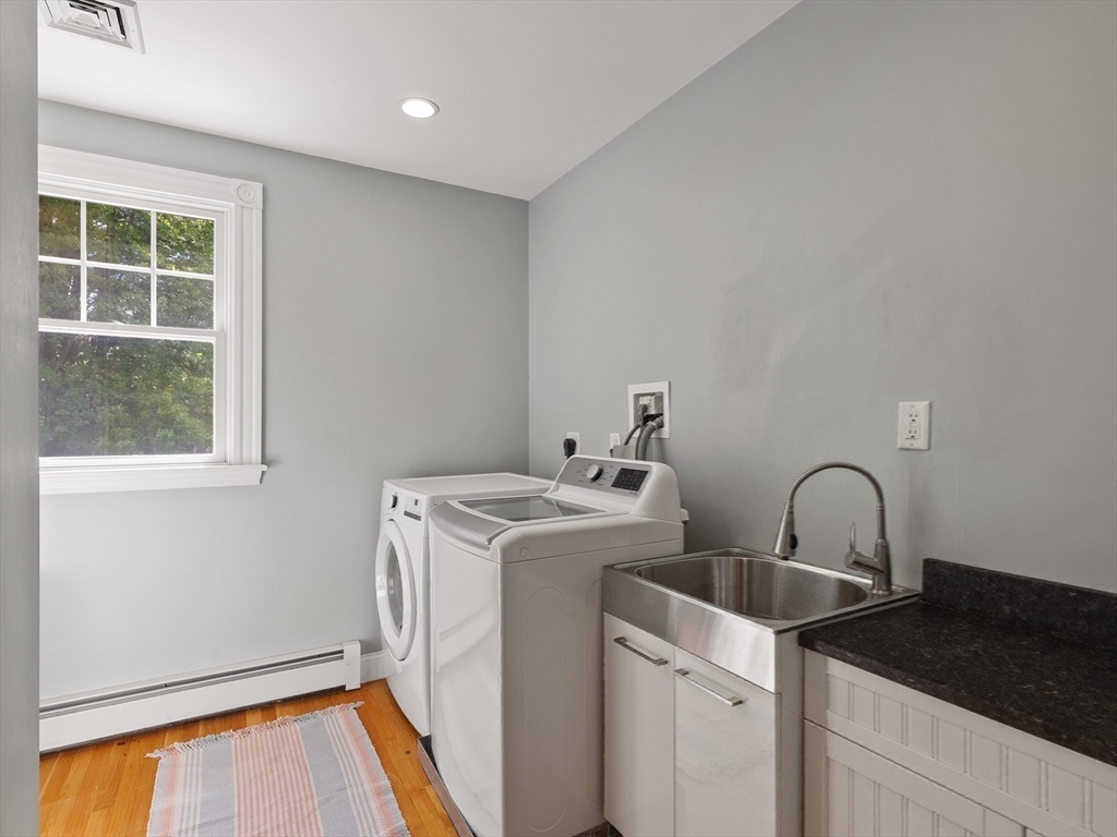 22 Bryant Road Lexington, MA 02420 - Photo 30 of 40 a utility room with dryer and washer