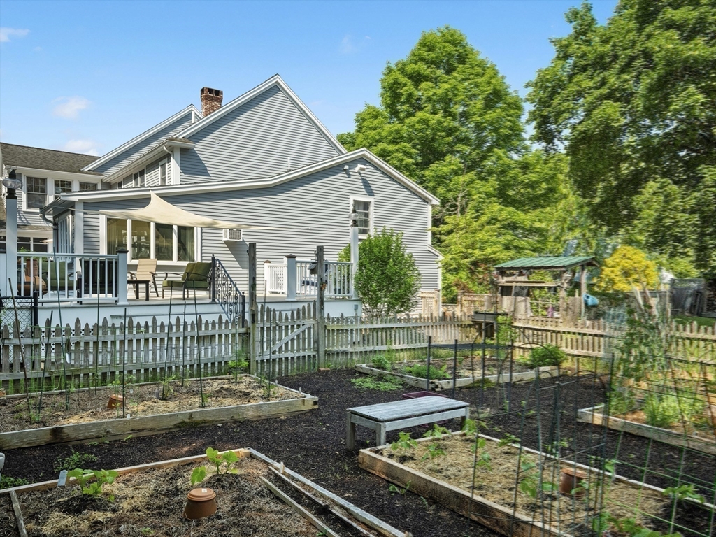 22 Bryant Road Lexington, MA 02420 - Photo 36 of 40 a front view of a house with garden
