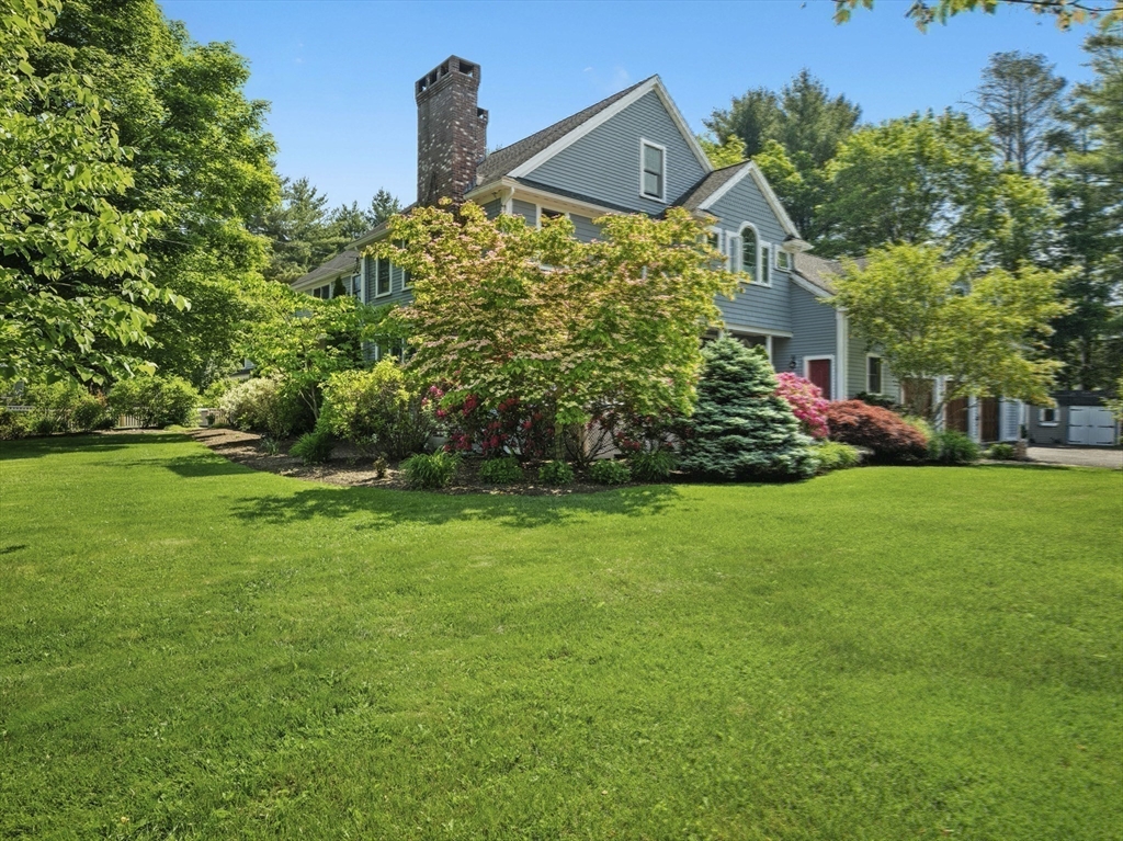 22 Bryant Road Lexington, MA 02420 - Photo 38 of 40 a view of a house with a yard