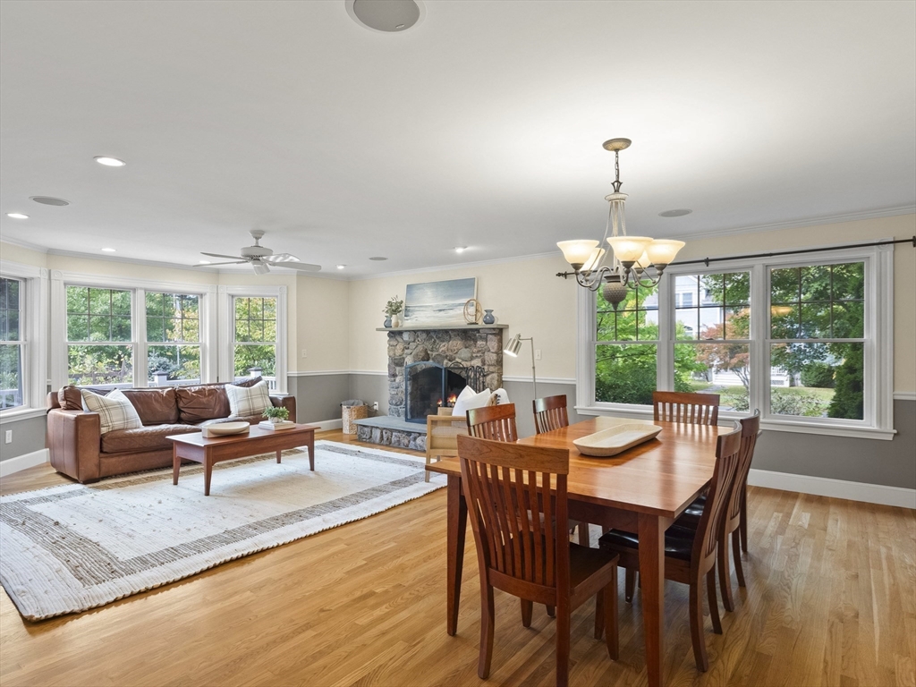 22 Bryant Road Lexington, MA 02420 - Photo 5 of 40 a dining room with furniture a chandelier and wooden floor