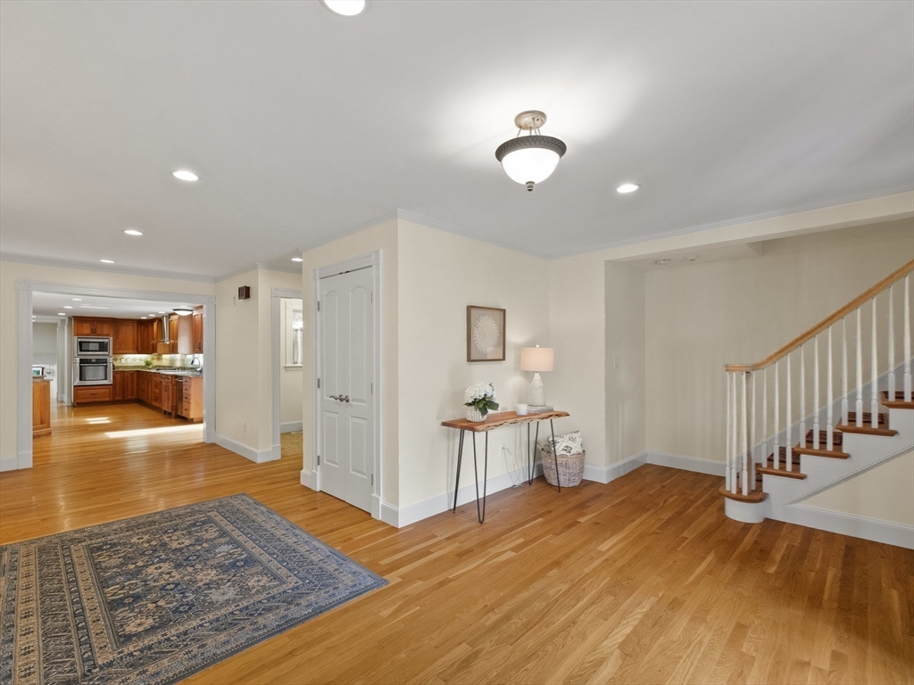 22 Bryant Road Lexington, MA 02420 - Photo 8 of 40 a view of a livingroom with wooden floor and furniture