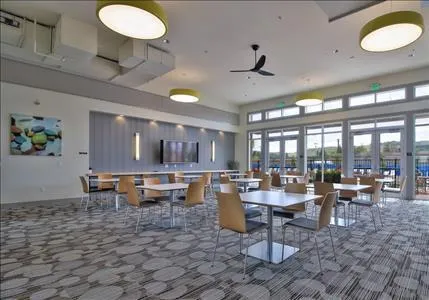 a view of a park with welcome board