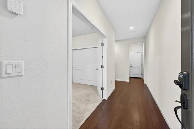a view of entryway with wooden floor
